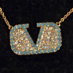 Elegant Gold and Blue Pendant Necklace